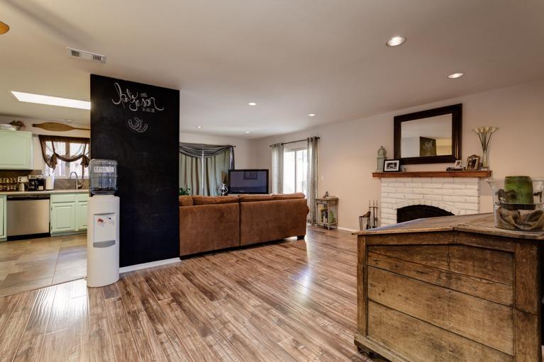 637 Thomas Street Oak View, CA 93022 - Photo 5 of 30 a living room with furniture fireplace and flat screen tv