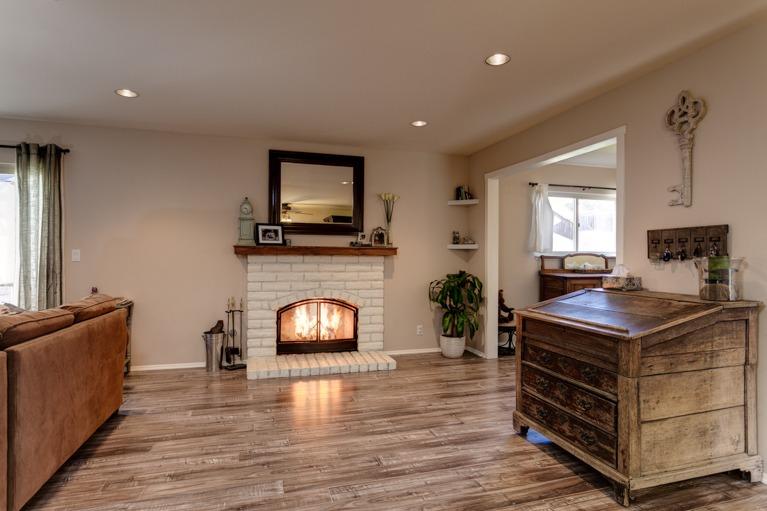 637 Thomas Street Oak View, CA 93022 - Photo 6 of 30 a kitchen with a stove and a fireplace