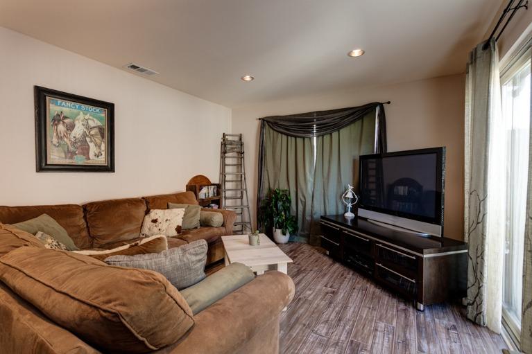 637 Thomas Street Oak View, CA 93022 - Photo 8 of 30 a living room with furniture and a flat screen tv
