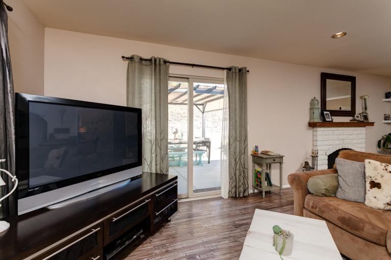 637 Thomas Street Oak View, CA 93022 - Photo 9 of 30 a living room with furniture and a flat screen tv
