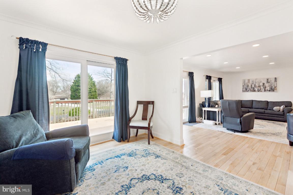 11213 Oakwood Drive Dunkirk, MD 20754 - Photo 16 of 48 a bedroom with furniture and large windows