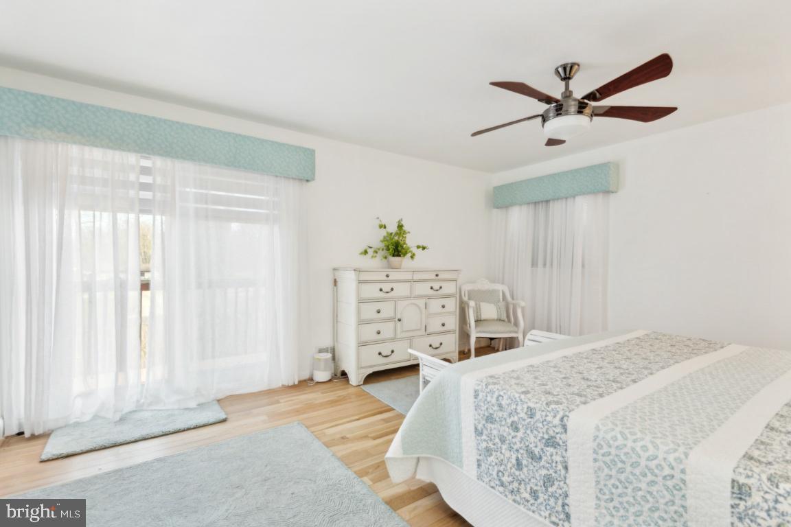 11213 Oakwood Drive Dunkirk, MD 20754 - Photo 23 of 48 a bedroom with a bed and a window