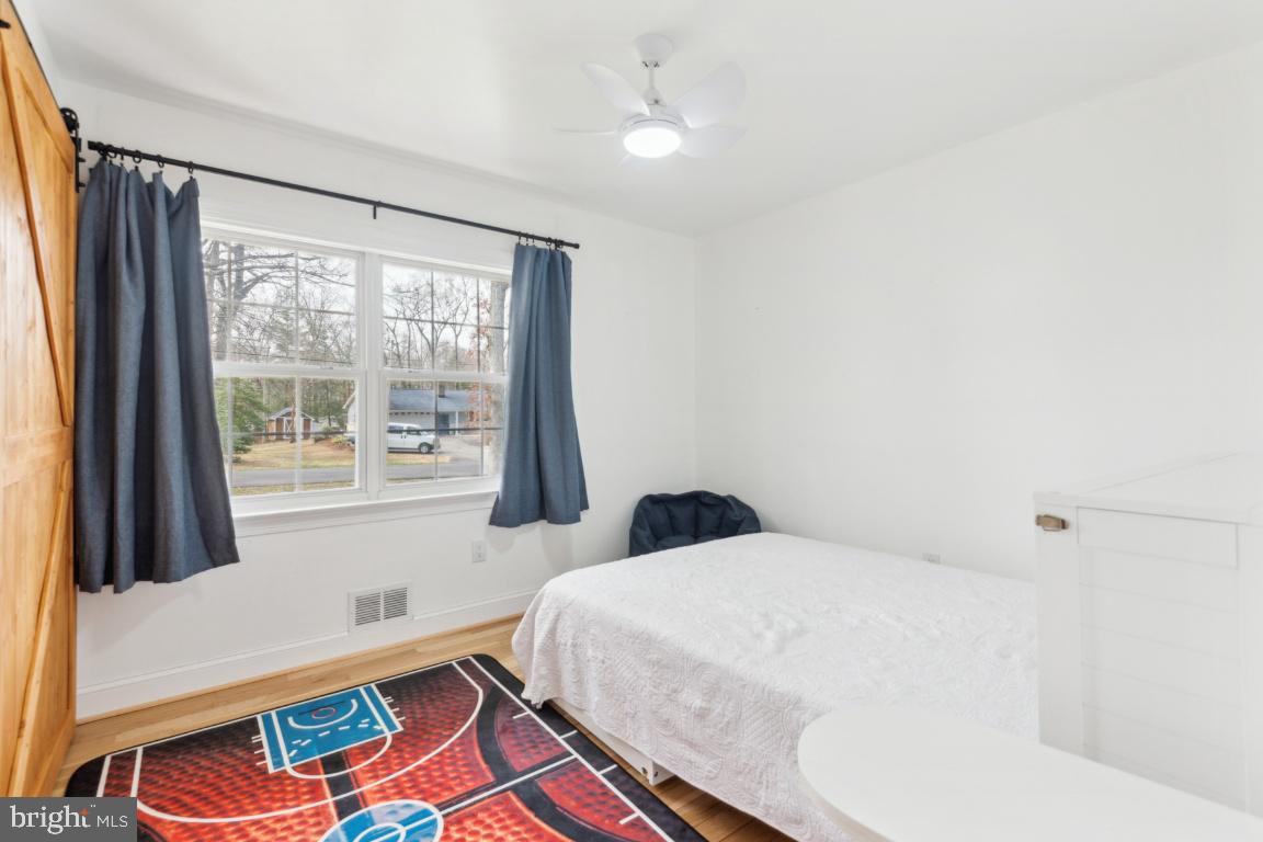 11213 Oakwood Drive Dunkirk, MD 20754 - Photo 27 of 48 a bedroom with a bed and a window