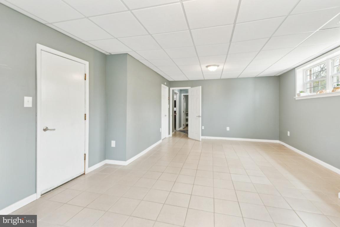 11213 Oakwood Drive Dunkirk, MD 20754 - Photo 31 of 48 a view of an empty room with a window