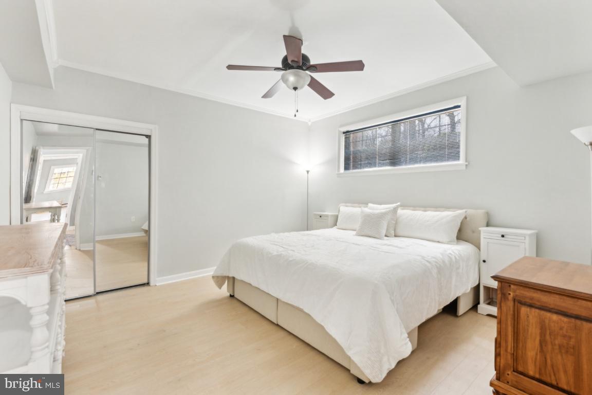 11213 Oakwood Drive Dunkirk, MD 20754 - Photo 32 of 48 a bedroom with a bed and closet