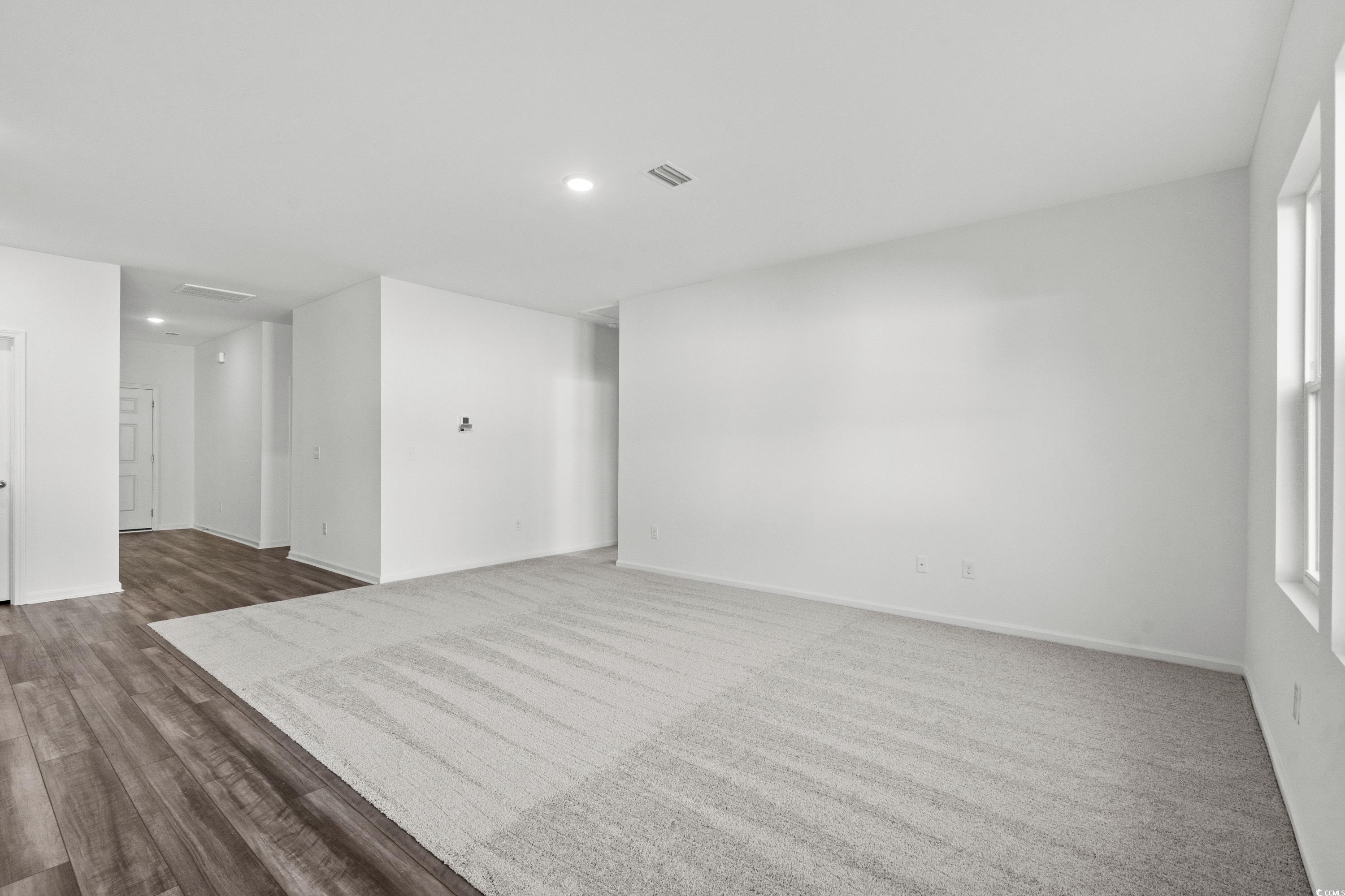443 Castillo Drive Longs, SC 29568 - Photo 18 of 32 Spare room featuring recessed lighting and wood finished floors