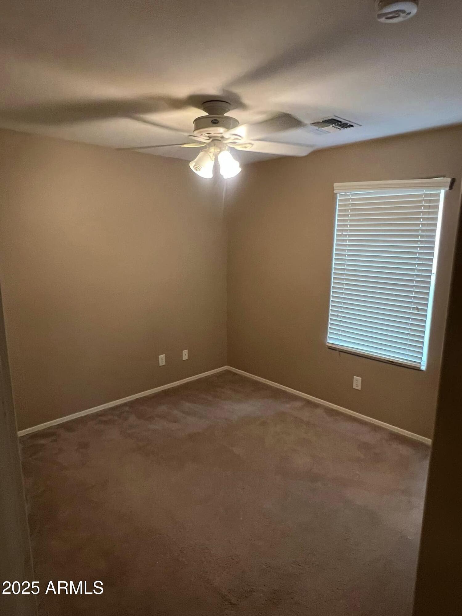 4265 East Milky Way Gilbert, AZ 85295 - Photo 11 of 33 a view of an empty room with a window