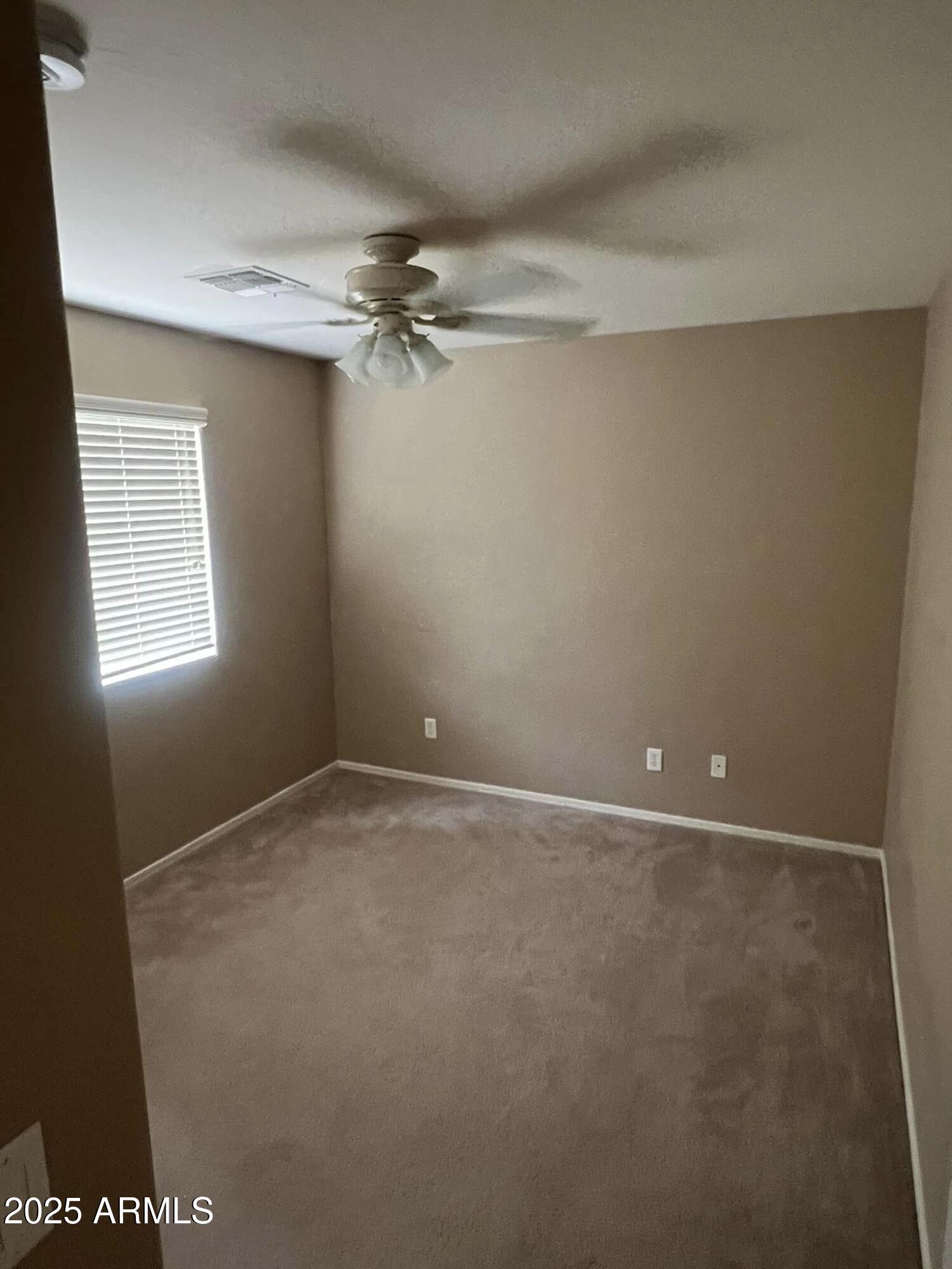 4265 East Milky Way Gilbert, AZ 85295 - Photo 18 of 33 a view of an empty room with a window