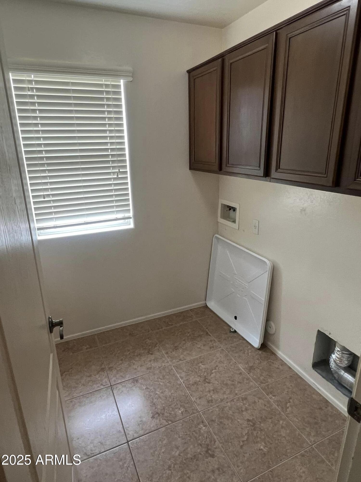 4265 East Milky Way Gilbert, AZ 85295 - Photo 29 of 33 a view of an empty room with a window