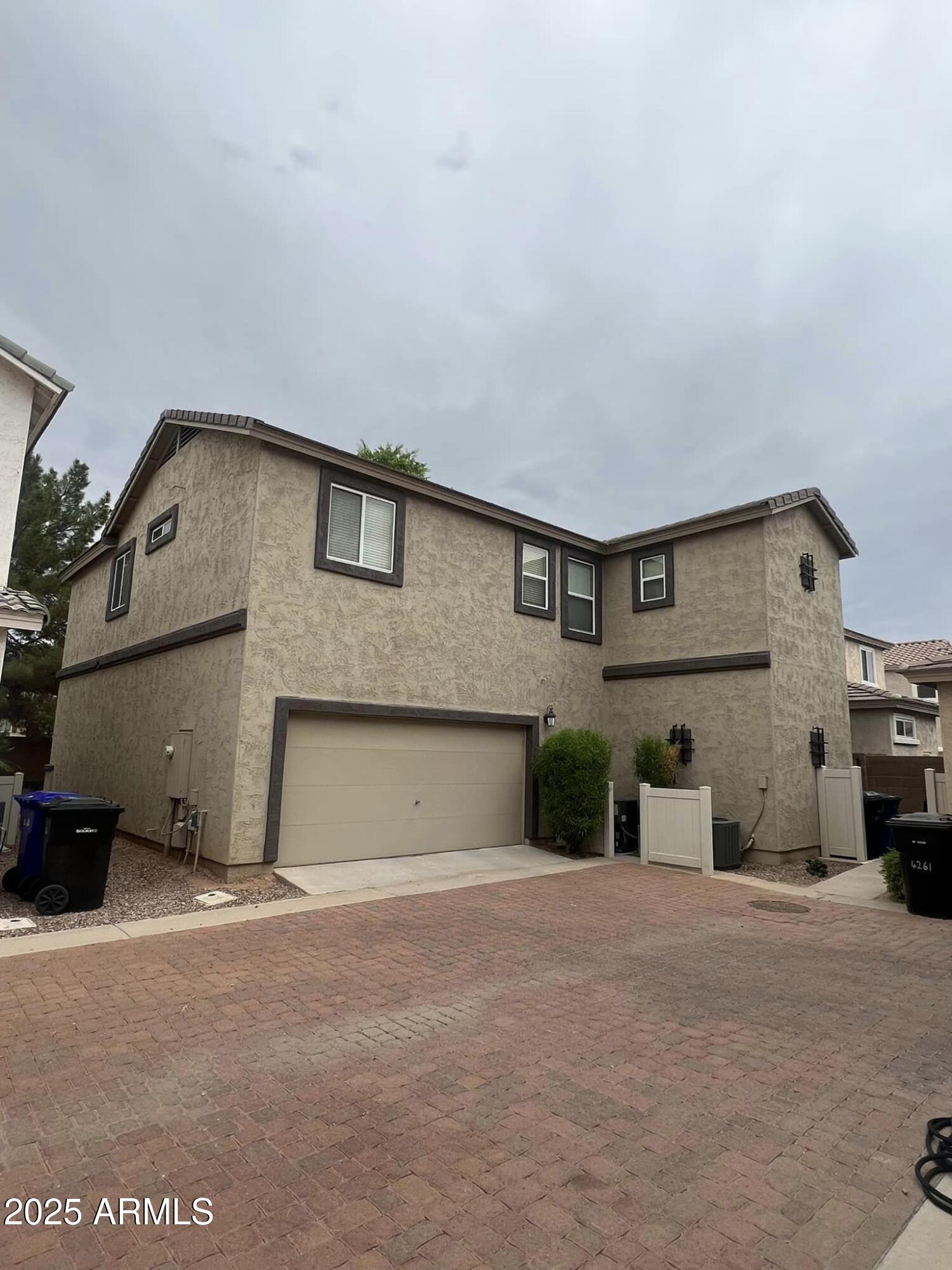4265 East Milky Way Gilbert, AZ 85295 - Photo 3 of 33 a view of a house with a outdoor space