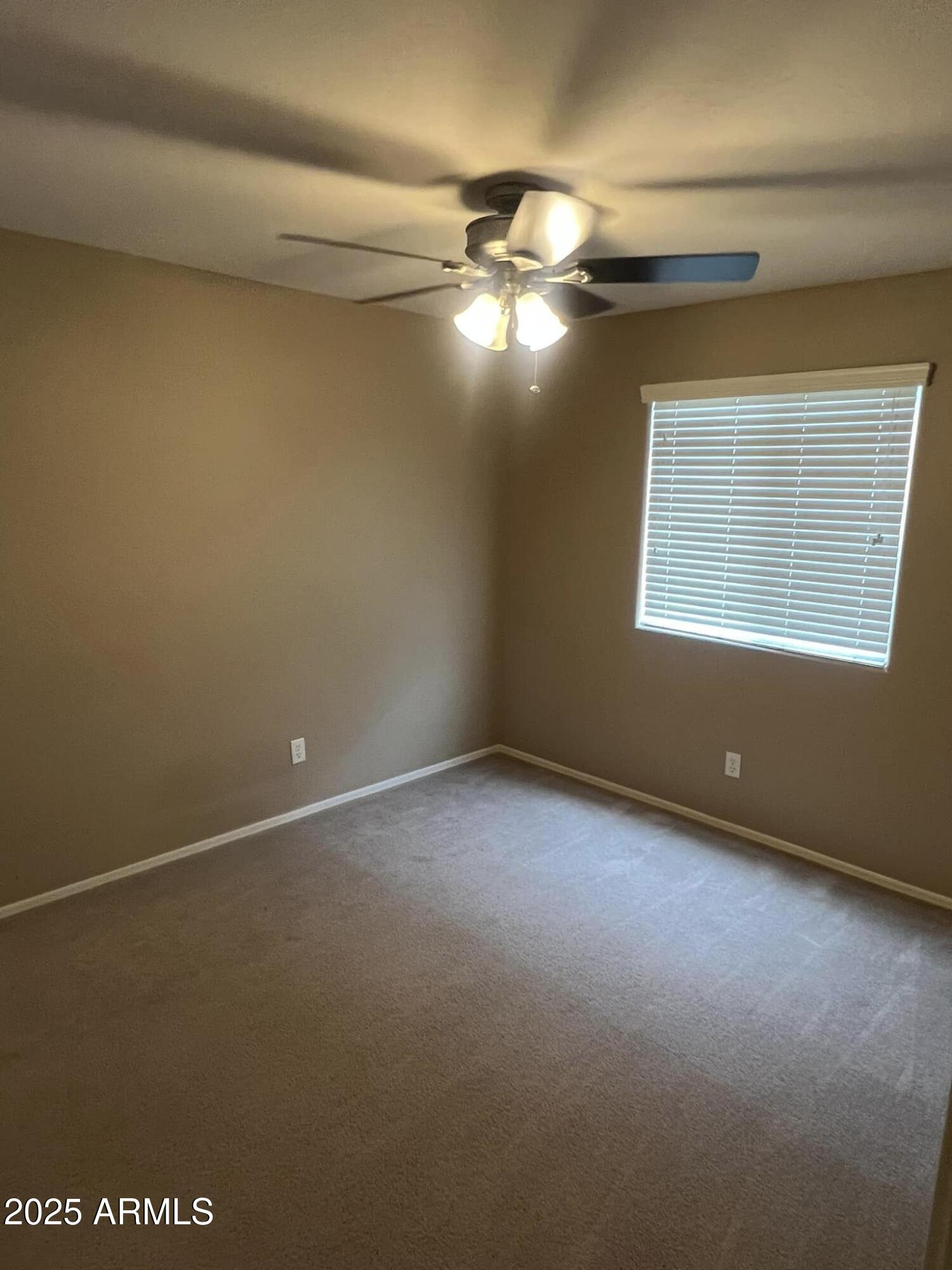 4265 East Milky Way Gilbert, AZ 85295 - Photo 31 of 33 a view of an empty room with a window
