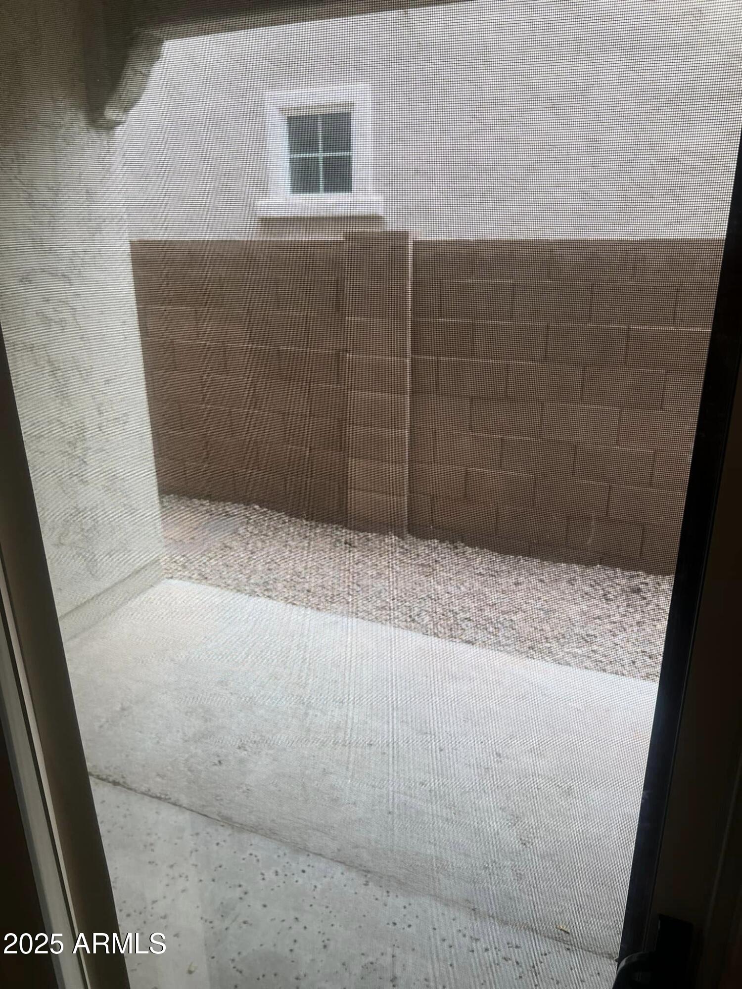 4265 East Milky Way Gilbert, AZ 85295 - Photo 32 of 33 a view of wooden door and brick wall