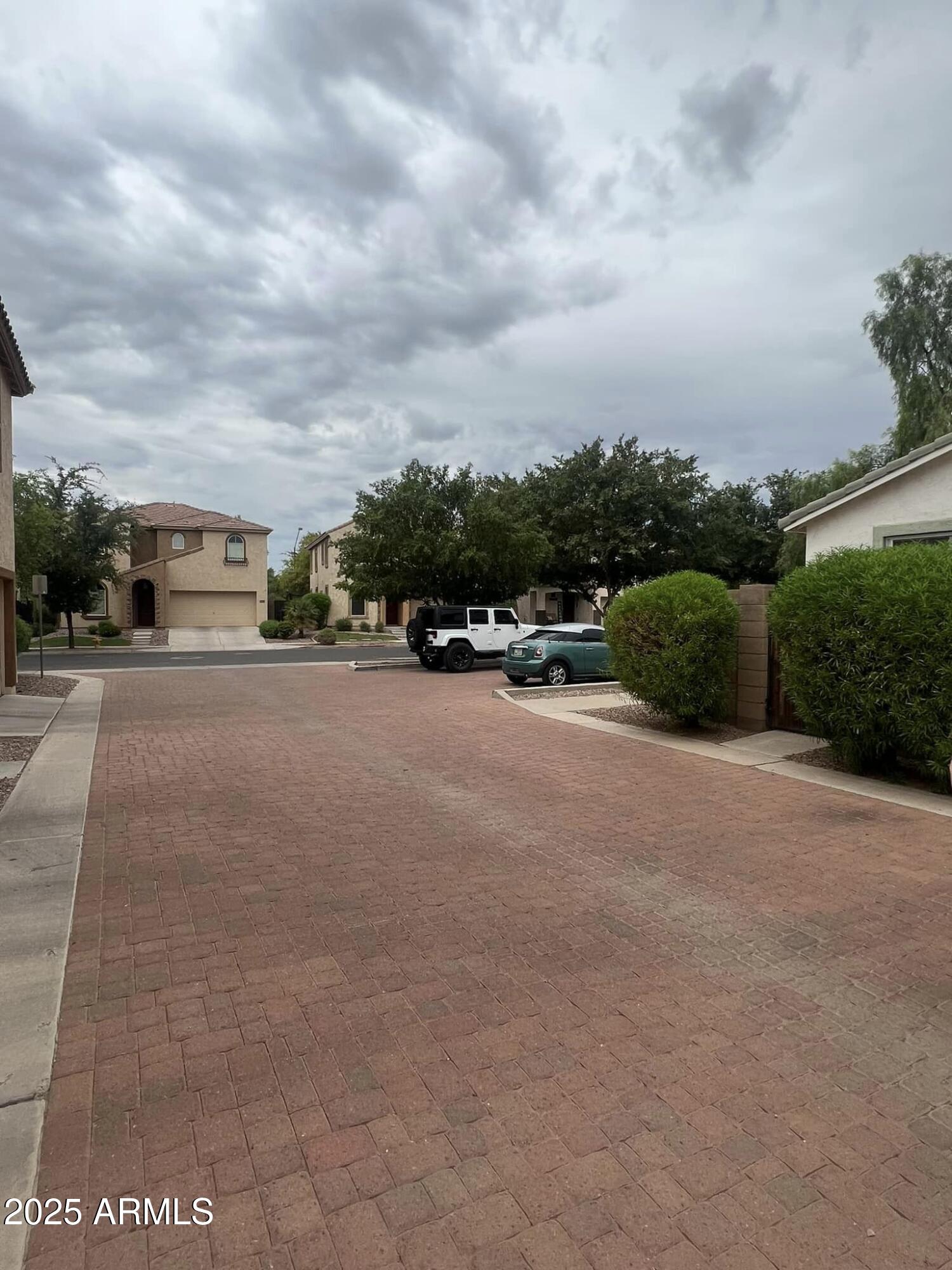 4265 East Milky Way Gilbert, AZ 85295 - Photo 33 of 33 a view of a road with a big yard