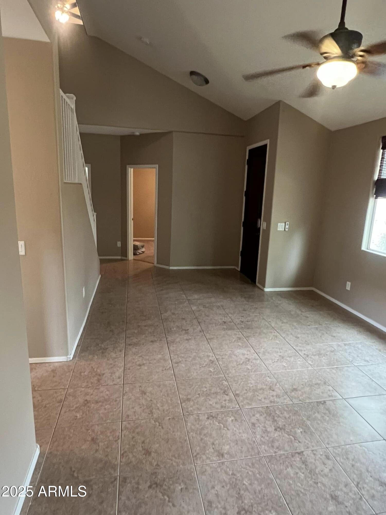 4265 East Milky Way Gilbert, AZ 85295 - Photo 5 of 33 a view of an empty room with a window