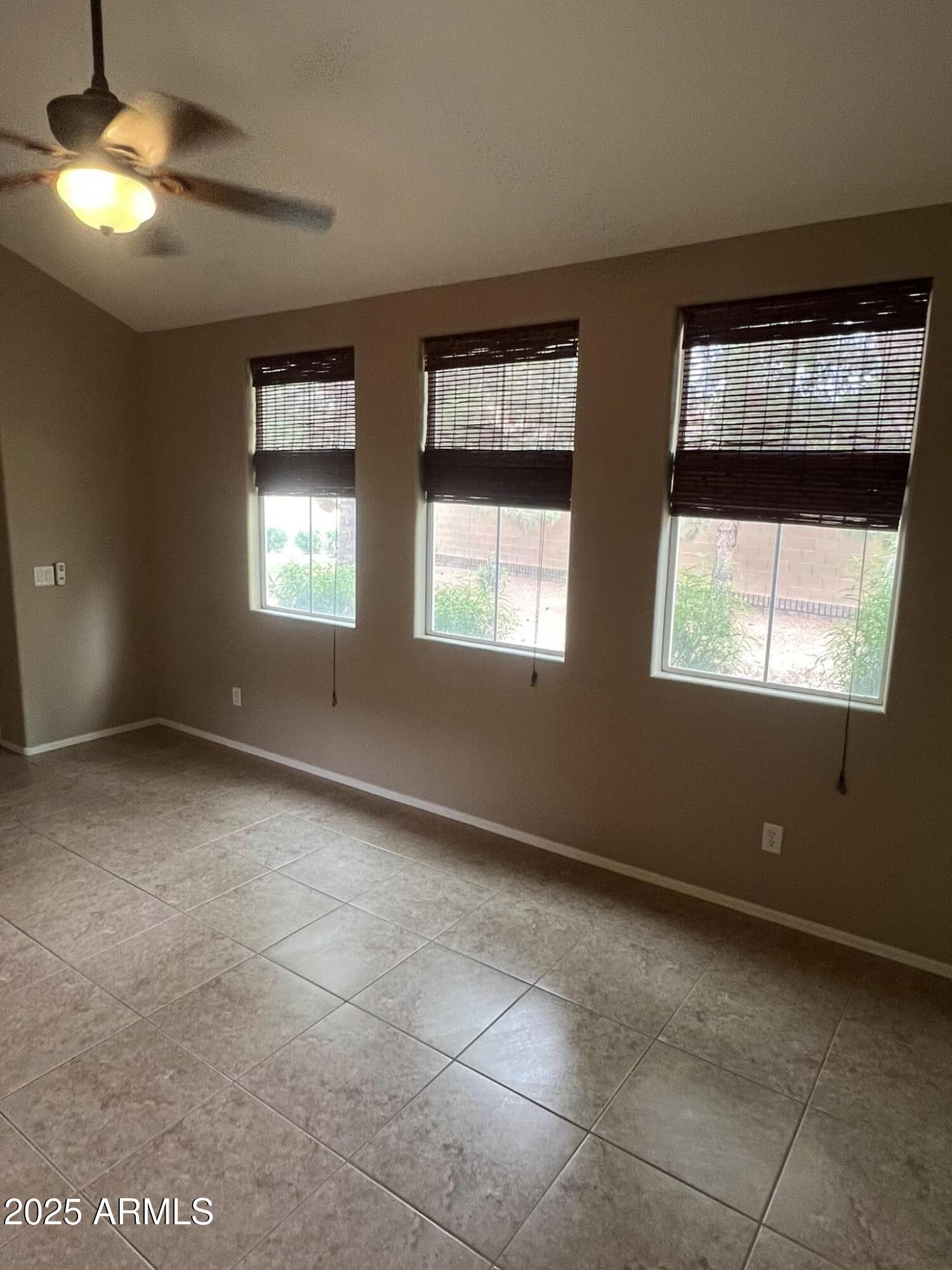 4265 East Milky Way Gilbert, AZ 85295 - Photo 8 of 33 a view of an empty room with a window