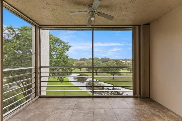 a view of a couple of people in a room