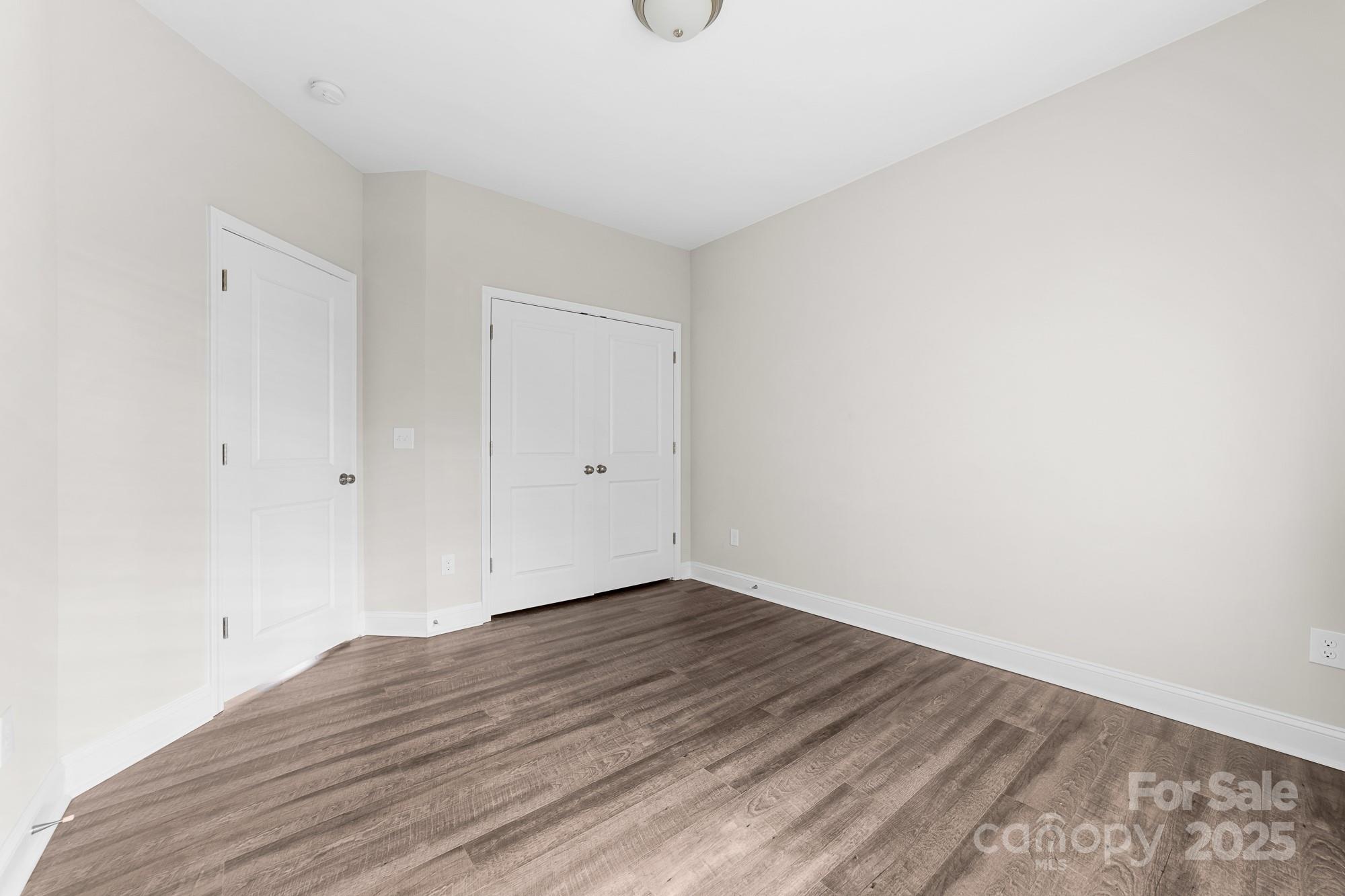 7617 Red Robin Trail Denver, NC 28037 - Photo 29 of 38 a view of room with wooden floor