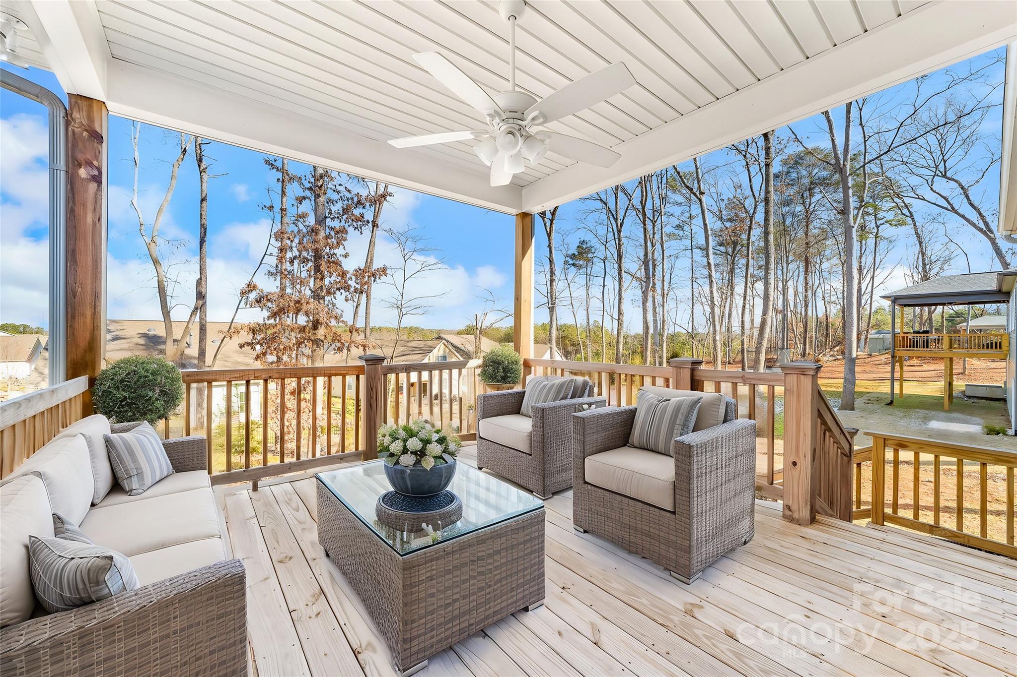 7617 Red Robin Trail Denver, NC 28037 - Photo 30 of 38 a living room with furniture and a large window