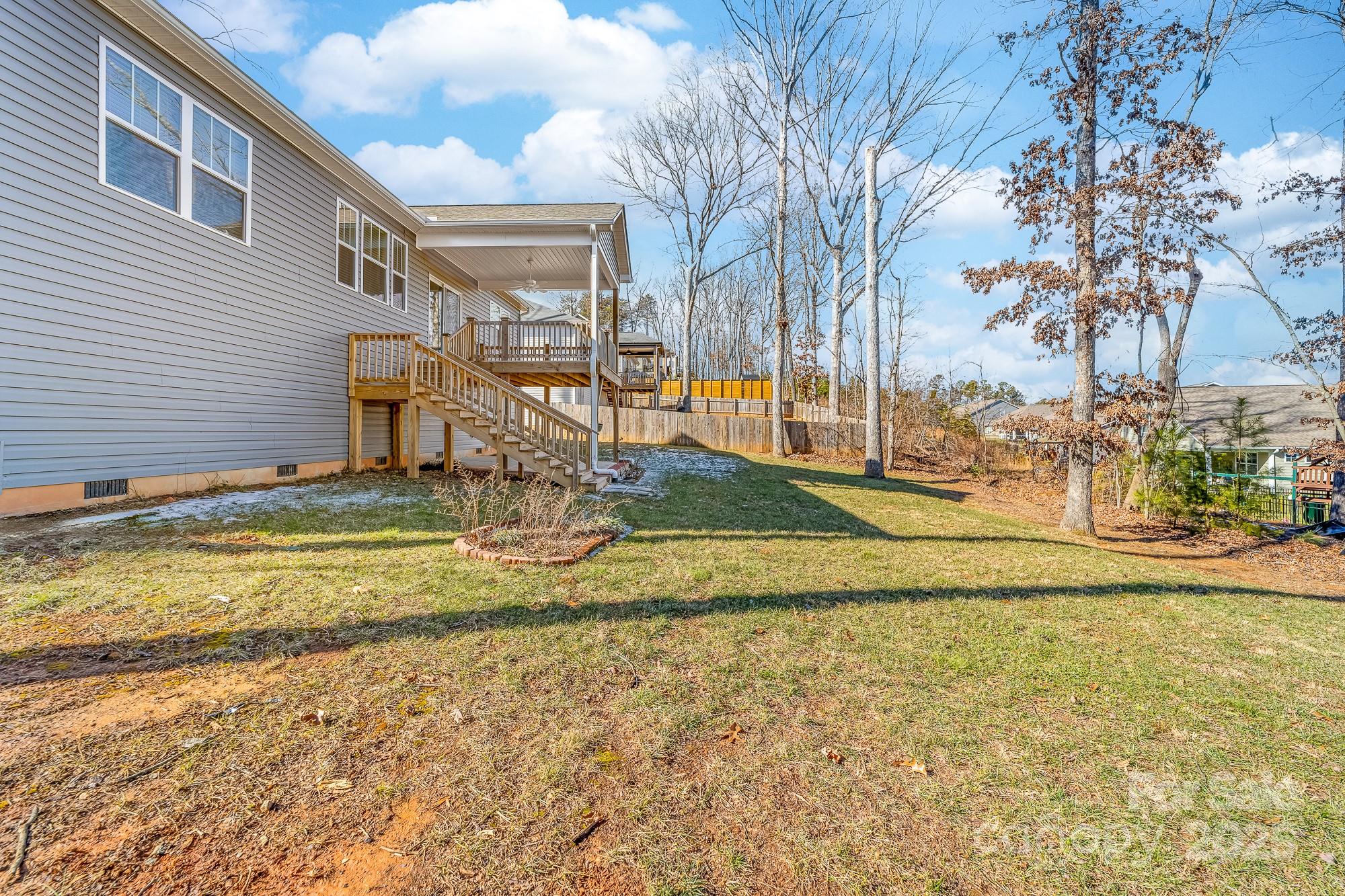 7617 Red Robin Trail Denver, NC 28037 - Photo 36 of 38 a view of a yard in front of a house