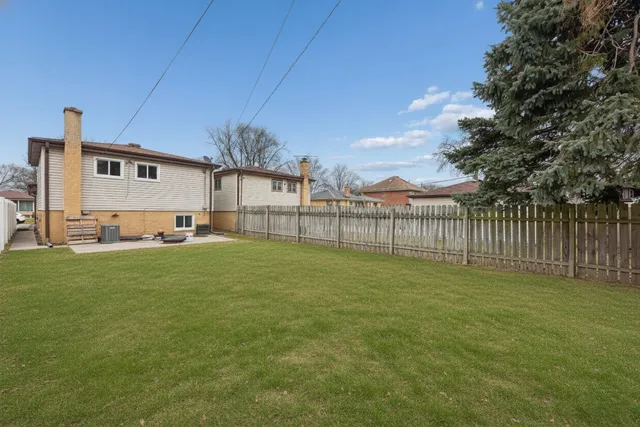 a view of a backyard with a garden
