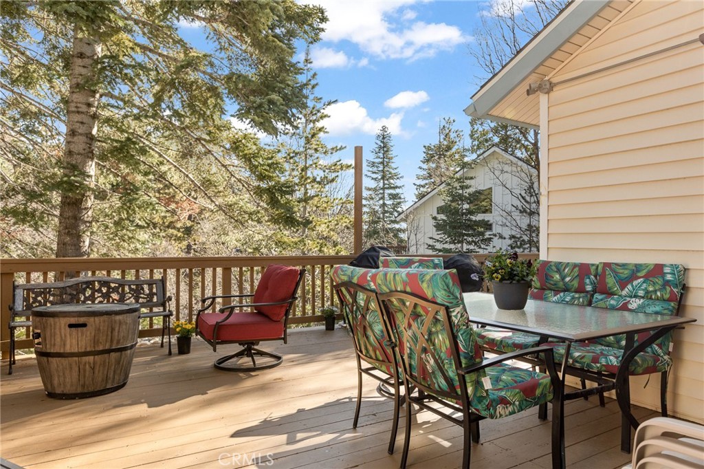 337 Lookout Drive Twin Peaks, CA 92391 - Photo 26 of 32 a view of chairs and table in the balcony