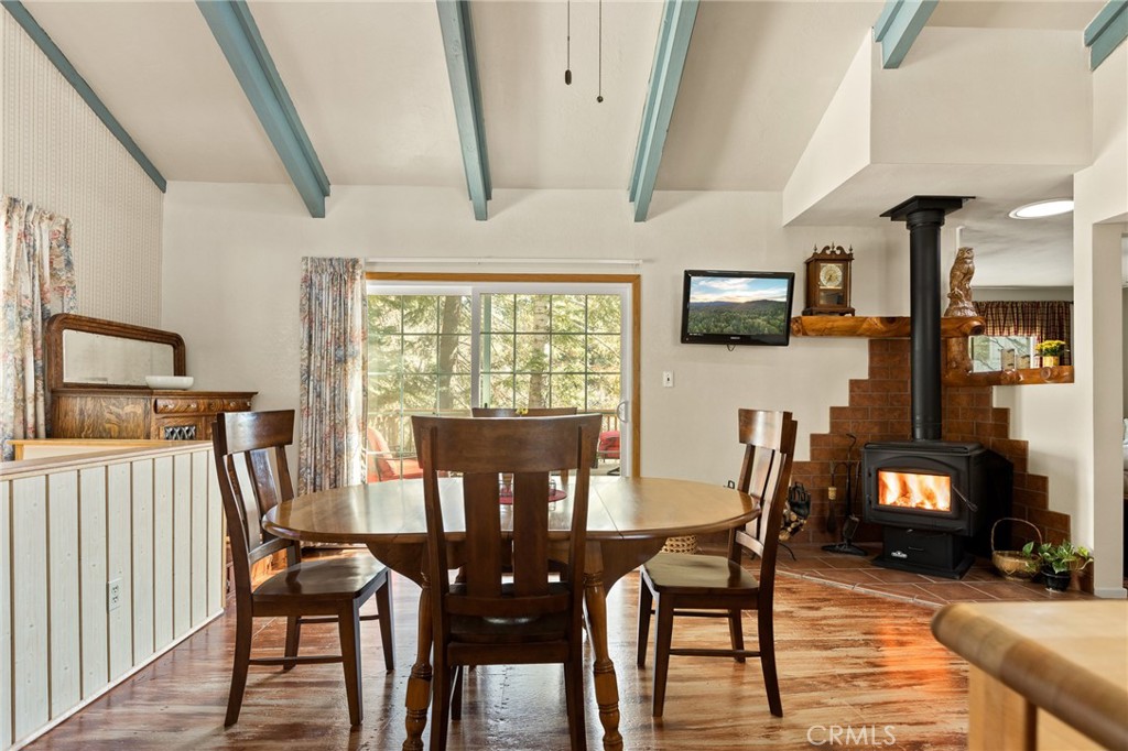 337 Lookout Drive Twin Peaks, CA 92391 - Photo 6 of 32 a dining room with furniture and wooden floor