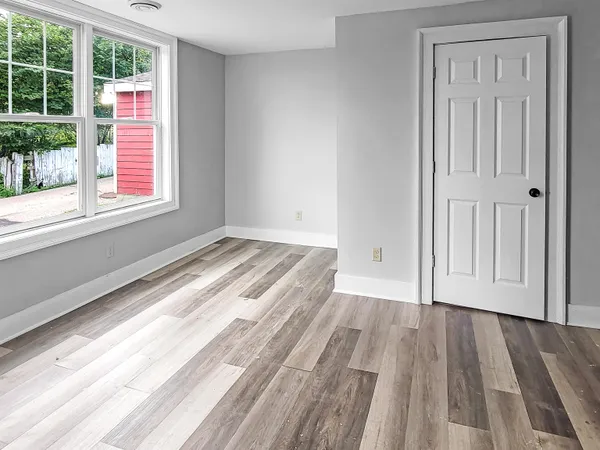 a bathroom with a bathtub and a toilet