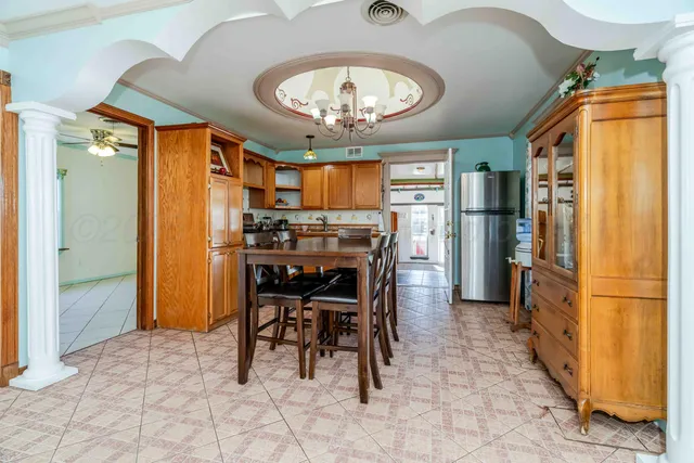 a view of a dining room with furniture