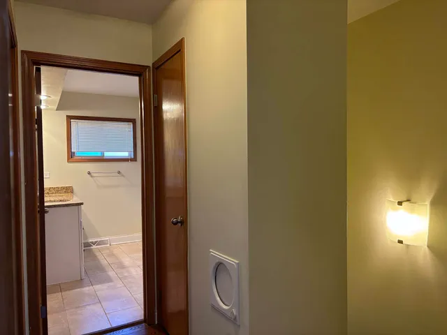 a bathroom with a toilet and a sink