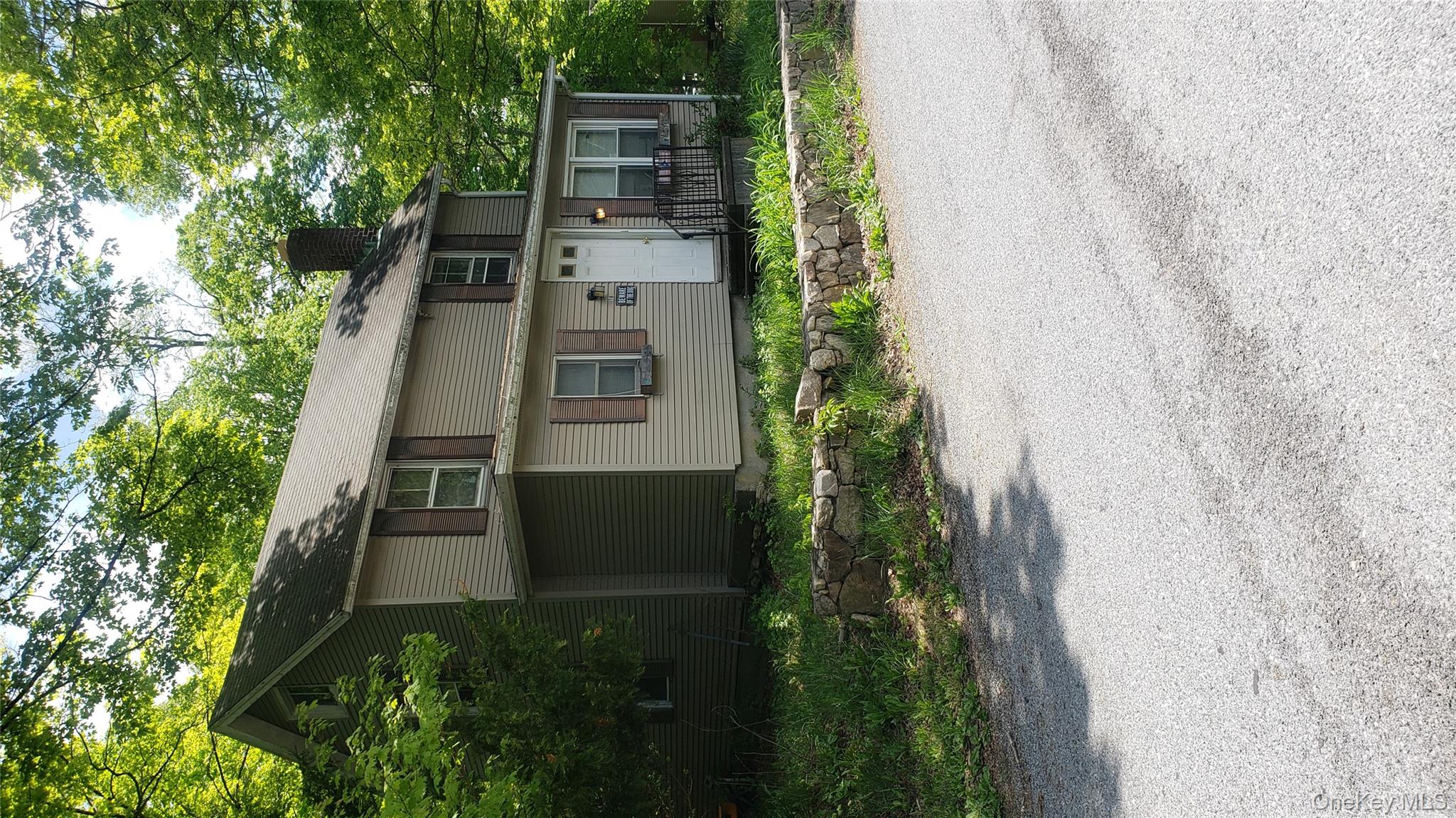 14 Southeast Mountain Road Wingdale, NY 12594 - Photo 1 of 10 View of front of property with a chimney and covered porch