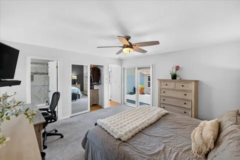 a bedroom with a bed and furniture
