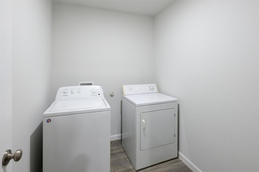 1106 Ripplewood Circle Chandler, TX 75758 - Photo 18 of 24 a utility room with dryer and washer