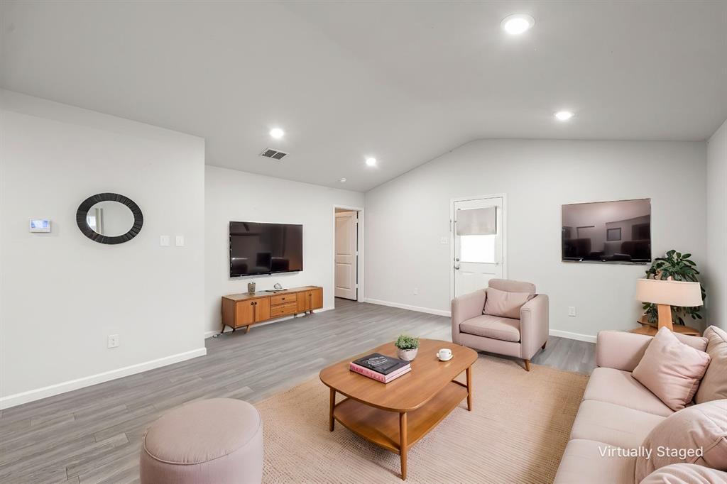 1106 Ripplewood Circle Chandler, TX 75758 - Photo 4 of 24 a living room with furniture and a flat screen tv