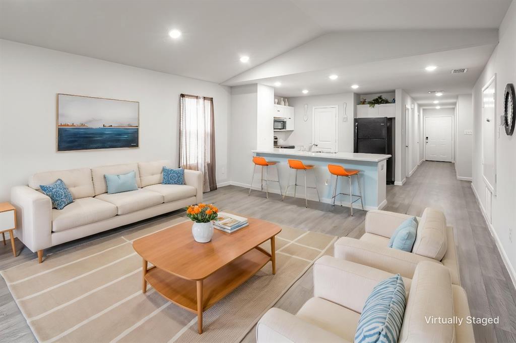 1106 Ripplewood Circle Chandler, TX 75758 - Photo 7 of 24 a living room with furniture and a flat screen tv