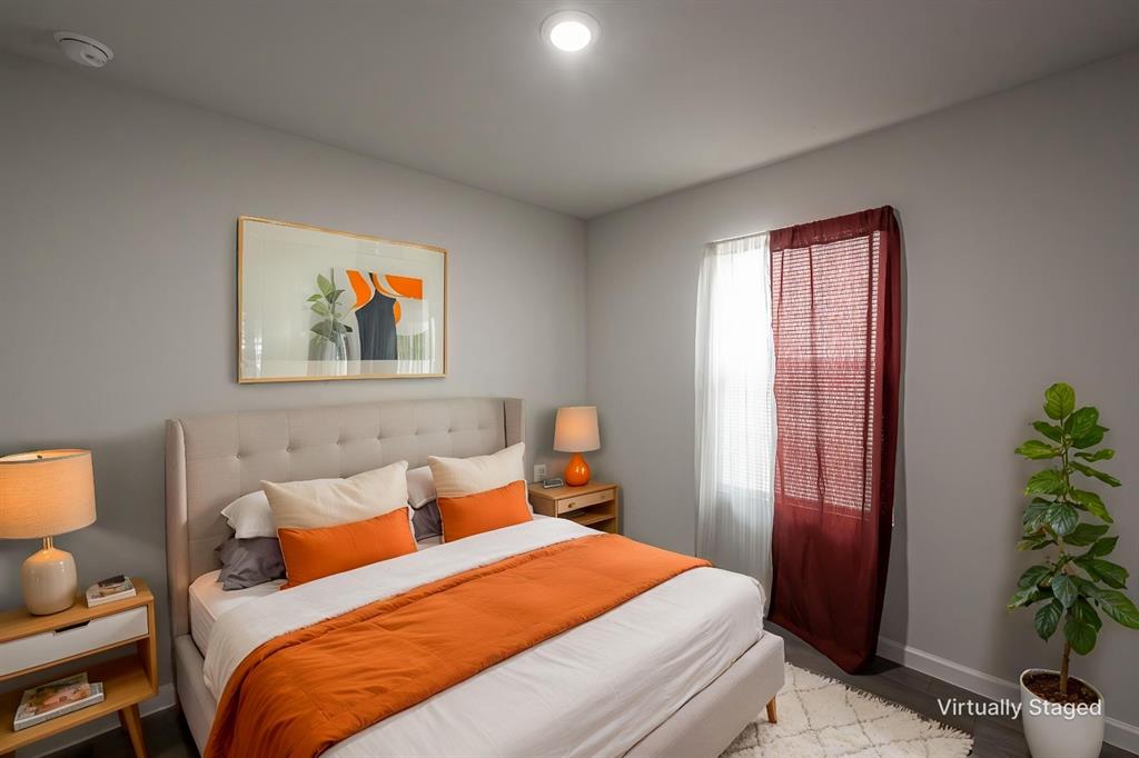 1106 Ripplewood Circle Chandler, TX 75758 - Photo 9 of 24 a bedroom with a bed and a painting on the wall