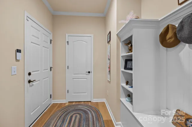 a large kitchen with lots of counter space and furniture