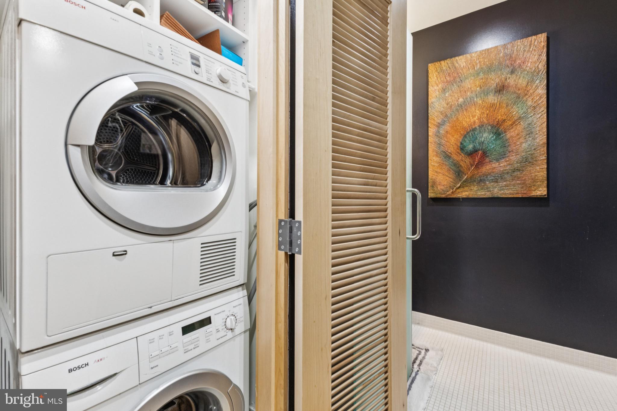 437 New York Avenue Northwest, Unit Y26 Washington, DC 20001 - Photo 11 of 16 a utility room with dryer and washer