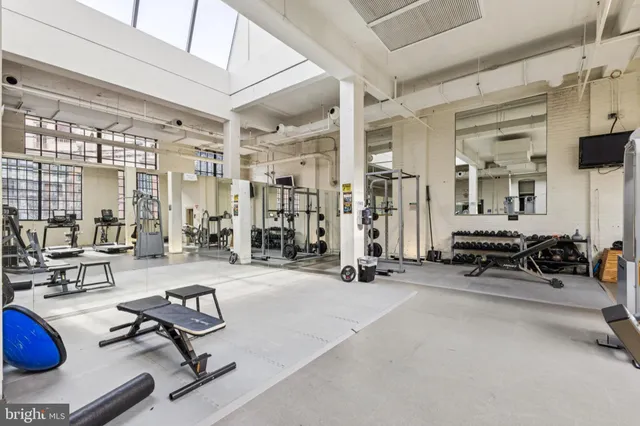 a view of a room with gym equipment