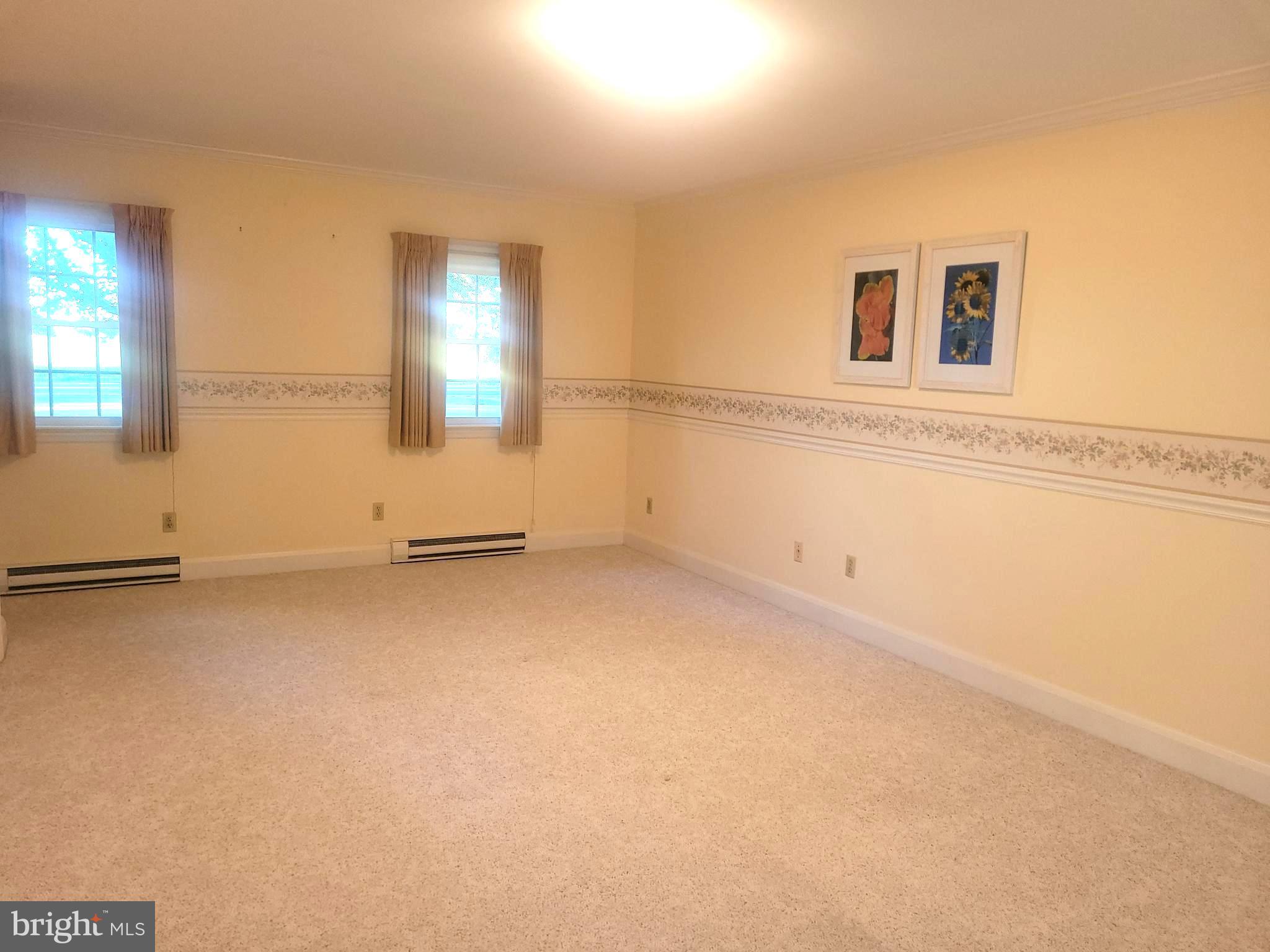 715 Sullivan Road Westminster, MD 21157 - Photo 13 of 59 an empty room with a windows