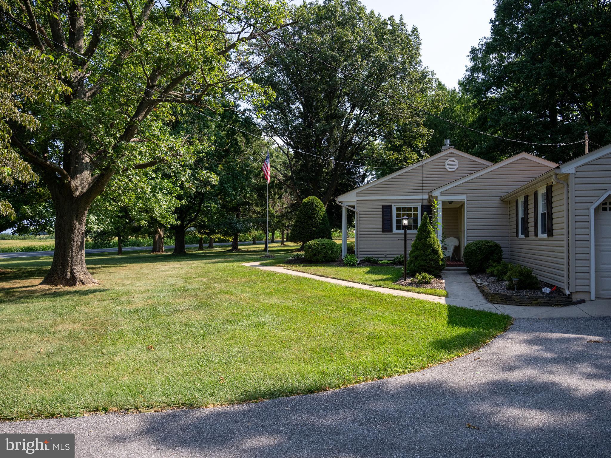 715 Sullivan Road Westminster, MD 21157 - Photo 51 of 59 a front view of a house with a yard