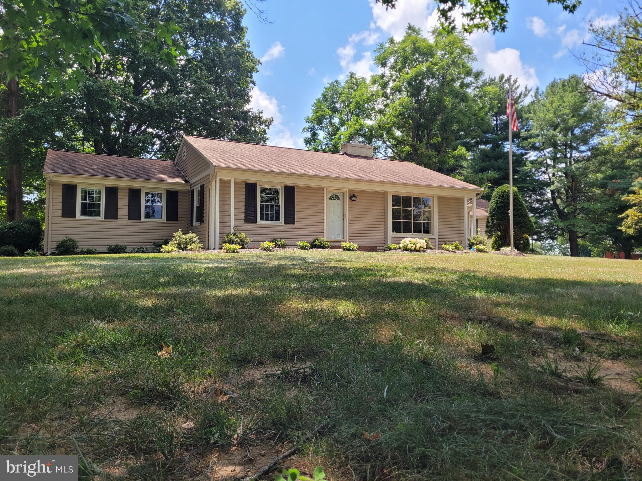 715 Sullivan Road Westminster, MD 21157 - Photo 56 of 59 a front view of house with yard and green space
