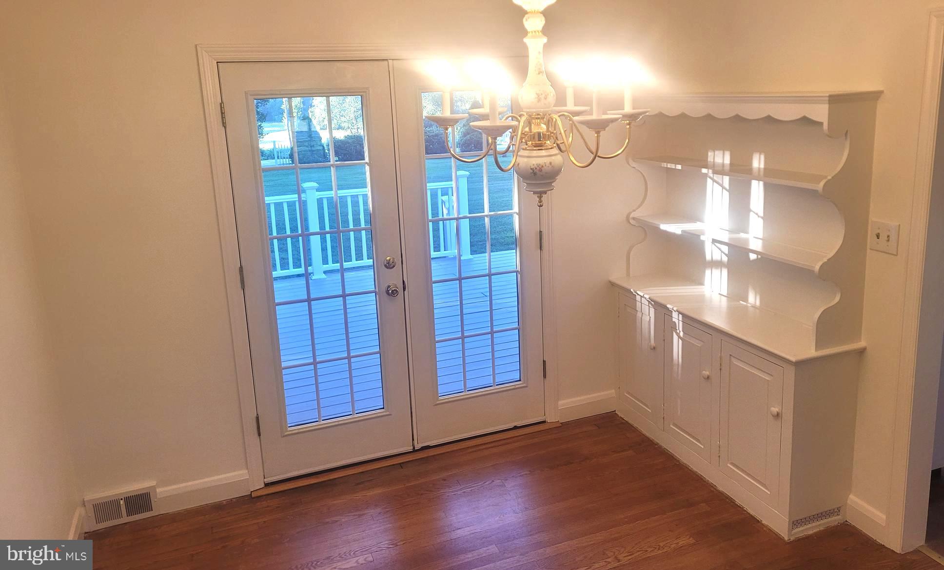 715 Sullivan Road Westminster, MD 21157 - Photo 7 of 59 a view of a room with wooden floor