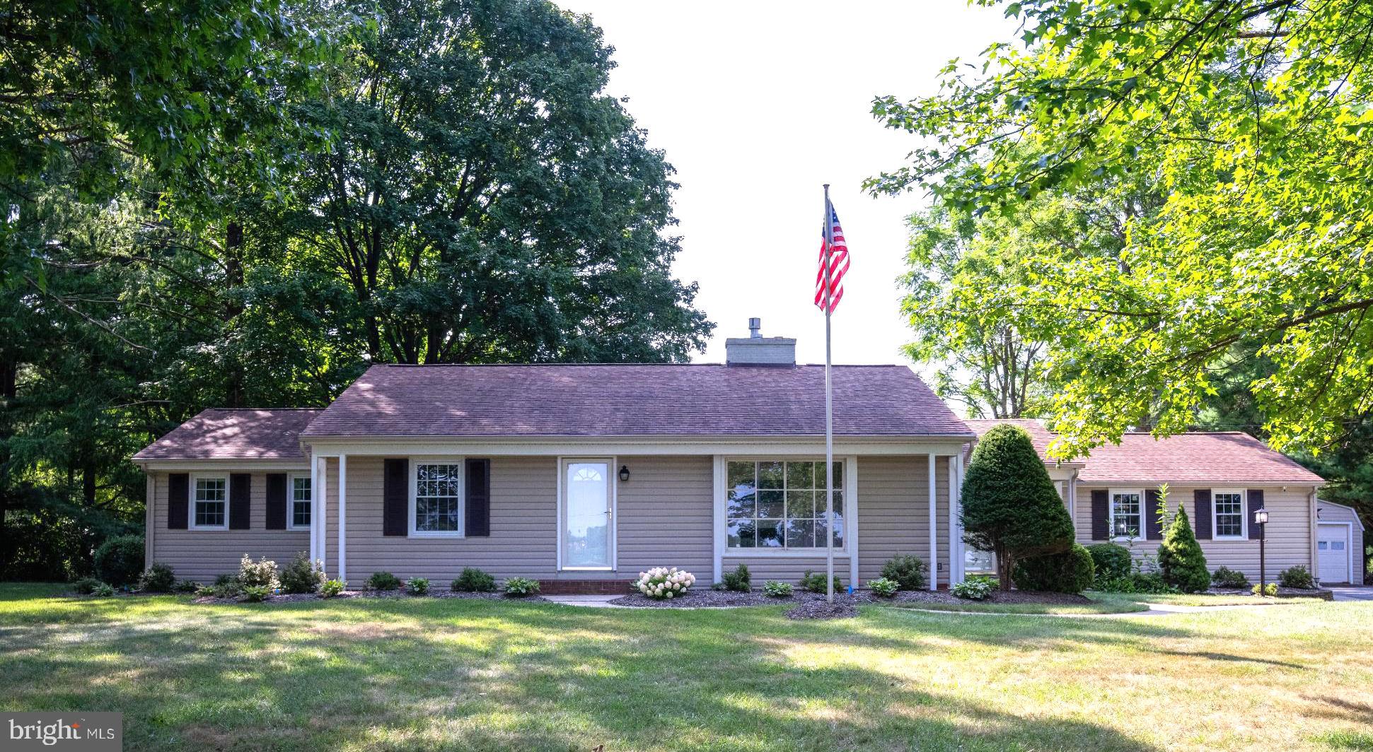 715 Sullivan Road Westminster, MD 21157 - Photo 9 of 59 a front view of a house with a yard