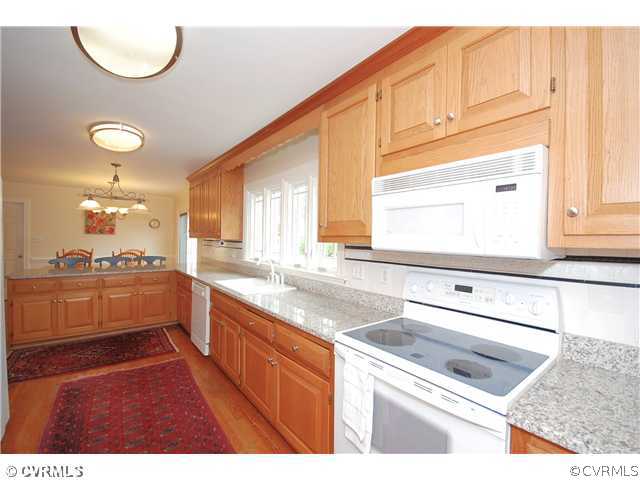 Kitchen - This spacious, eat-in KITCHEN has been u
