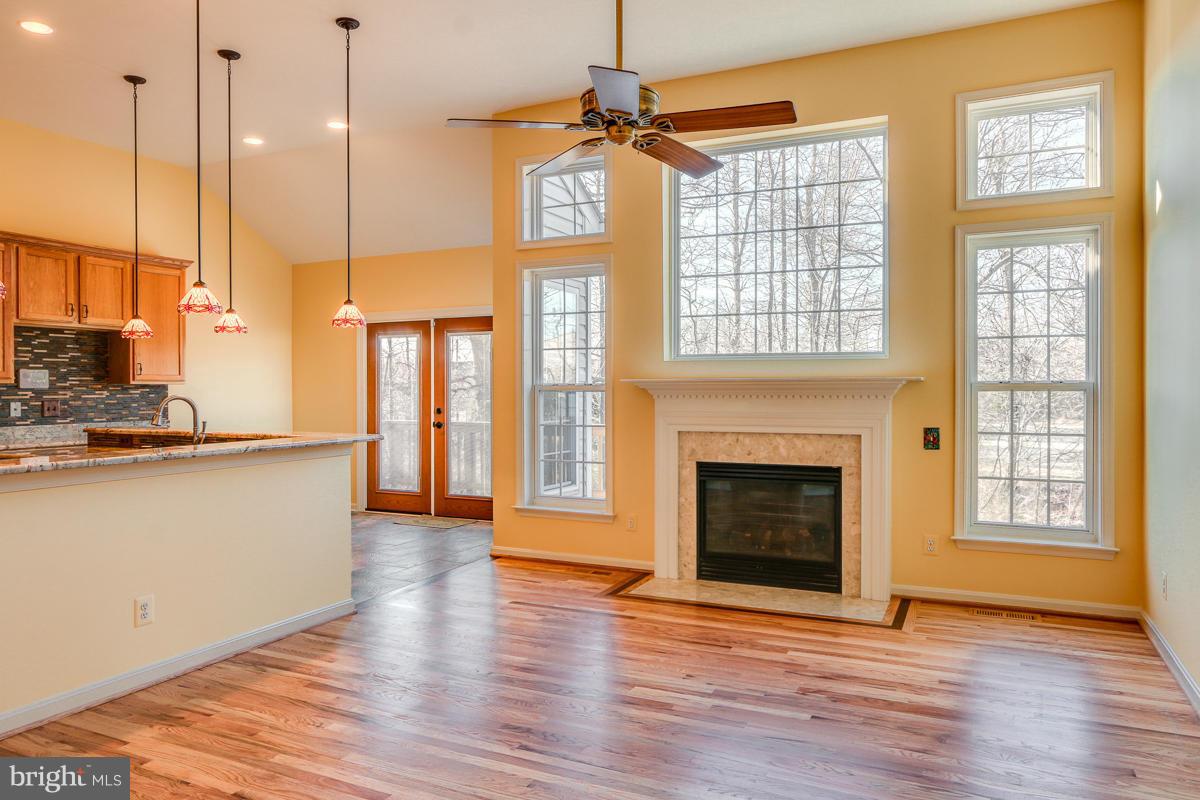 2482 Leyland Ridge Road Herndon, VA 20171 - Photo 12 of 29 a view of an empty room with window and wooden floor