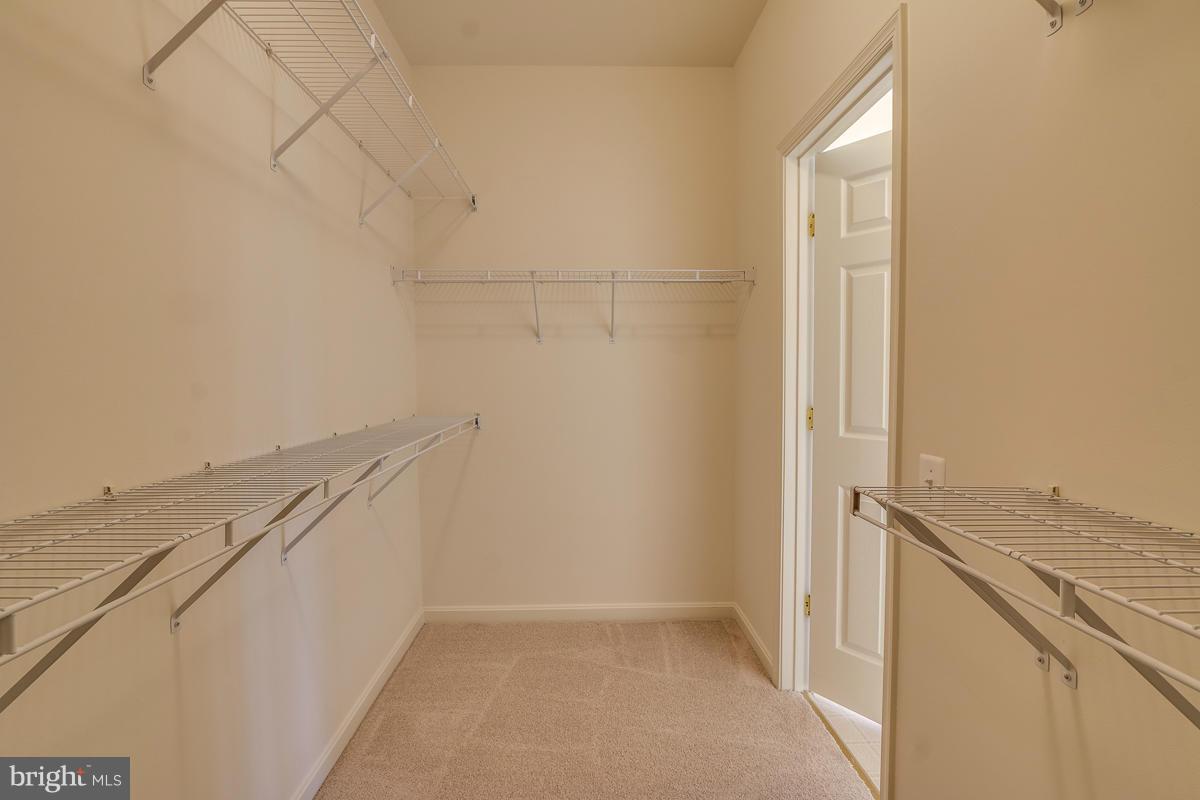 2482 Leyland Ridge Road Herndon, VA 20171 - Photo 17 of 29 a view of storage and utility room with washer and dryer