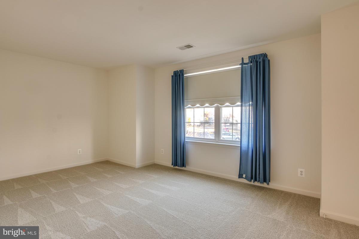 2482 Leyland Ridge Road Herndon, VA 20171 - Photo 22 of 29 a view of an empty room with a window