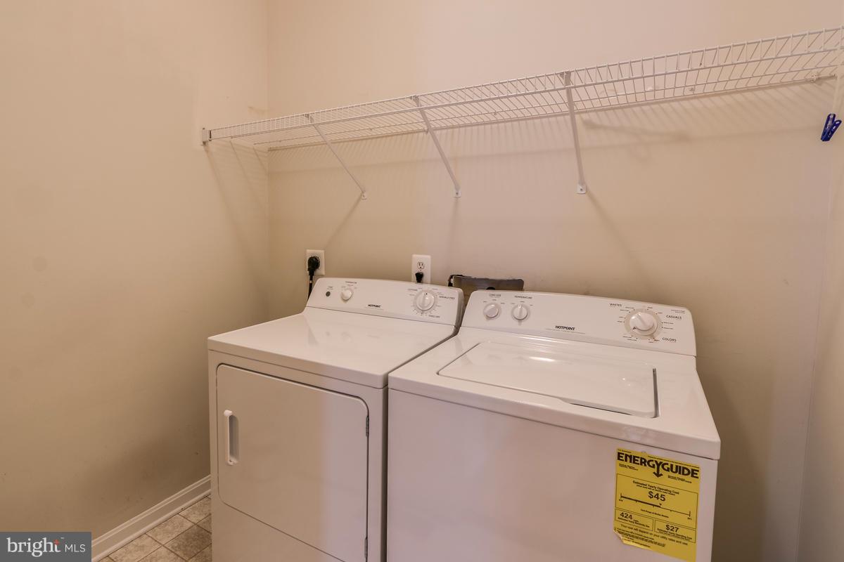 2482 Leyland Ridge Road Herndon, VA 20171 - Photo 6 of 29 a utility room with dryer and washer