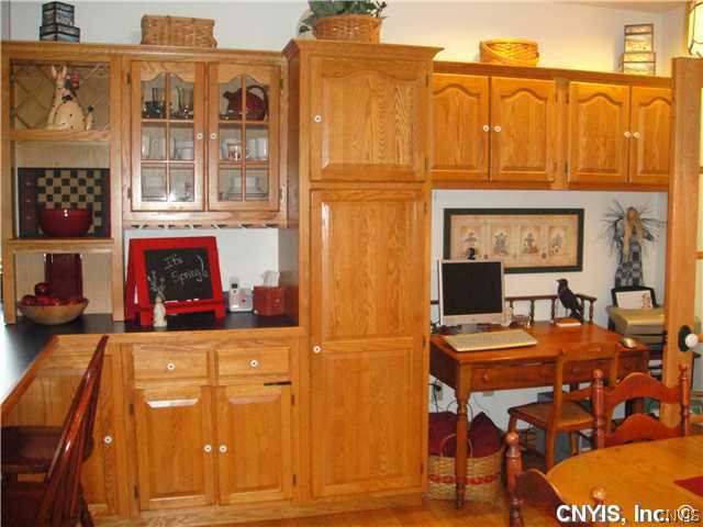 76 Utica Street Hamilton, NY 13346 - Photo 7 of 16 Kitchen Kitchen extends to eat in area w/both brea