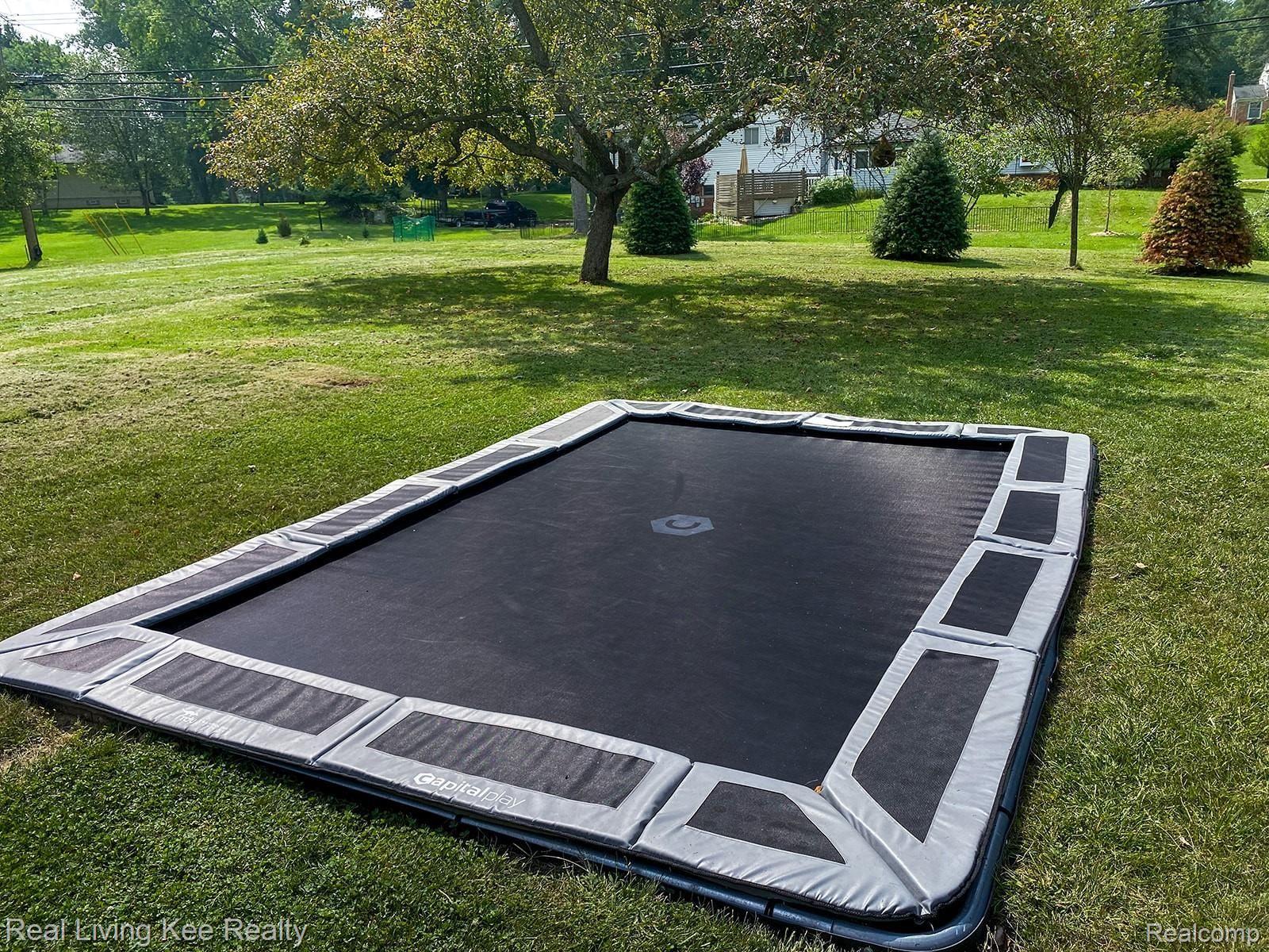 1744 Crooks Road Rochester, MI 48309 - Photo 33 of 34 This in-ground trampoline pleases kids of all ages. If the next buyer does not want it, the seller will remove it and fill with dirt and lay sod